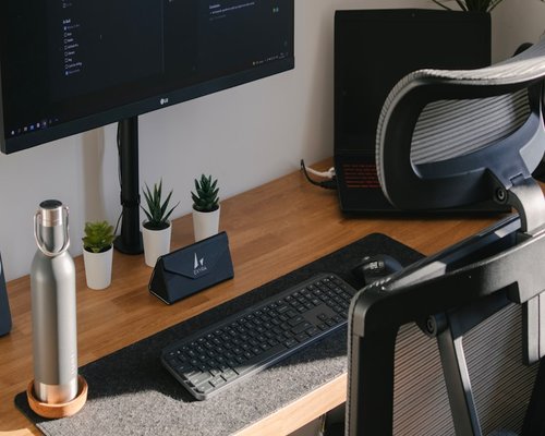 home workspace with water on the desk